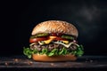 close-up delicious juicy burger with meat patty, vegetables and a bun with sesame seeds, on a dark background