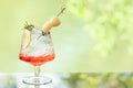 Delicious juicy fresh lemon soda and red water and Lychee on glass table Blurred leaf reflection background Royalty Free Stock Photo