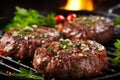 Close up of a delicious and juicy grilled meat burger patty cooking on a sizzling hot pan