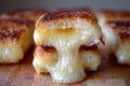 Close up of delicious melted cheese sandwich on wooden board, ideal for food photography