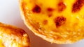 Close up delicious portuguese egg tart on white box