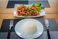 Close up delicious special thai food  Stir fried Chicken with cashew nuts not spicy with steamed rice ,decorate on wooden table Royalty Free Stock Photo