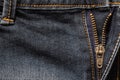 Close up of denim jeans texture material background with zipper. Royalty Free Stock Photo