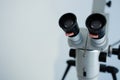 Close-up of a dental microscope on a white background. Royalty Free Stock Photo