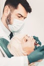 Close up of dentist examining patients teeth Royalty Free Stock Photo