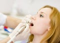 Close-up dentist procedure of teeth polishing with clean
