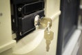 close up deposit safe or cash box with key