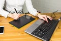 Close-up of designer using graphics tablet while working with computer Royalty Free Stock Photo