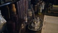 Close-up of desk with antique accessories and books. Action. Themed Museum with antique pieces of desk and newspaper in