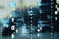 Close up of desktop with laptop and abstract coding binary code hologram on blurry background. Artificial intelligence and Royalty Free Stock Photo