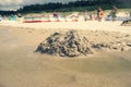 Close up on destroyed sand castle on the beach