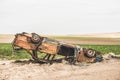 Close up detail of abandoned rusty burnt car wreck. Royalty Free Stock Photo