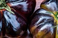 Detail Black heirloom tomatoes on rustic vintage wooden crate Royalty Free Stock Photo