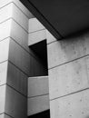 Close up detail of an angled textured grey concrete brutalist building with geometric shapes on the 1960s roger stevens building