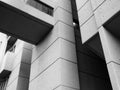 Close up detail of an angled textured grey concrete brutalist building with geometric shapes on the 1960s roger stevens building