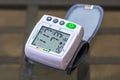 Close up, detail of blood pressure cuff monitor isolated. Digital blood pressure measuring device. Bucharest, Romania, 2020 Royalty Free Stock Photo