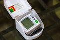 Close up, detail of blood pressure cuff monitor isolated. Digital blood pressure measuring device. Bucharest, Romania, 2021 Royalty Free Stock Photo