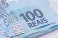 Close-up of detail of Brazilian banknote, concept of savings or investment, 100 reais banknotes