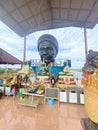 Detail of Buddha gold statues and statue of The famous monk named Luang Pu Mun in Chachoengsao at Thailand
