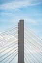 Close up detail with a cable stayed suspension bridge against the blue sky Royalty Free Stock Photo