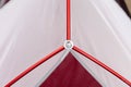 Close up detail of camping tent. Aluminum tent poles. Process of installing tent, setting up tent outdoors