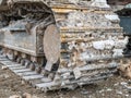 Close up detail with chain tracks of a bulldozer on a demolition site Royalty Free Stock Photo