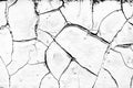 Close-up detail of cracked paint on wall. Black and white. Fragment of a surface of wall with cracked paint coating