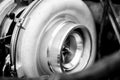 Close up detail of a diesel engine turbocharger , side view with selective focus