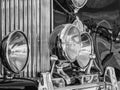 Close up detail with the front part and the headlights of an old vintage car Royalty Free Stock Photo