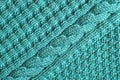 Abstract textured background of blue knitting