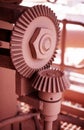 Close up detail of industrial cogs covered in mining ore dust