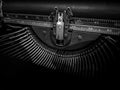 Close-up detail of the letters and ruler on old vintage typewriter, black and white style Royalty Free Stock Photo
