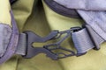 Close-up detail of locked gray convenient secure plastic clasp o