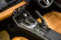 Close up of detail modern luxury car Interior - steering wheel, shift lever and dashboard Royalty Free Stock Photo