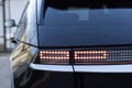 Close up detail on one of the LED red taillight modern luxury car. Car back lights shining. Exterior detail automobile Royalty Free Stock Photo