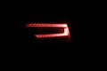 Close up detail on one of the LED red taillight modern luxury car. Exterior detail automobile. Tail light car. Detail on Royalty Free Stock Photo