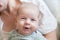 Close-up detail portrait of cute little peaceful smiling baby boy face Royalty Free Stock Photo