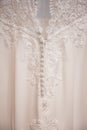 Close up detail shot of the back of a beautiful wedding dress Royalty Free Stock Photo