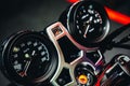 Close up detail shot of dashboard display of speedometer & analog gauge of modern sport motorcycle