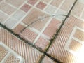close-up detail of the surface of an old ceramic tile or tile floor Royalty Free Stock Photo
