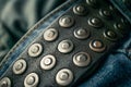close up detail of an unbuckled leather belt on a faded pair of blue jeans Royalty Free Stock Photo