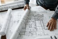 Close-up of detailed house plans and architectural designs on table for construction project. Royalty Free Stock Photo