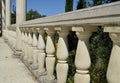 Close-up details of the balustrade, white marble columns, illuminated by the sun Royalty Free Stock Photo