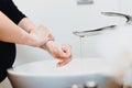 close up details of beautiful pregnant woman washing hands and cleaning hands from germs Royalty Free Stock Photo