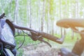close-up details of a bike against a blurred forest background, front and back background blurred with bokeh effect Royalty Free Stock Photo