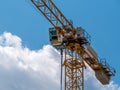 Close up details with a cabin control of a construction crane.Turret Slewing Crane against blue sky Royalty Free Stock Photo