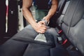 Close up details of car detailing - Cleaning and vacuuming car interior Royalty Free Stock Photo