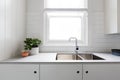 Close up details of contemporary white kitchen with subway tiles Royalty Free Stock Photo