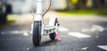 Close up details of electric scooter on the road. Ecological and urban transport in the city. Royalty Free Stock Photo