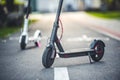 Close up details of electric scooter on the road. Ecological and urban transport in the city. Royalty Free Stock Photo